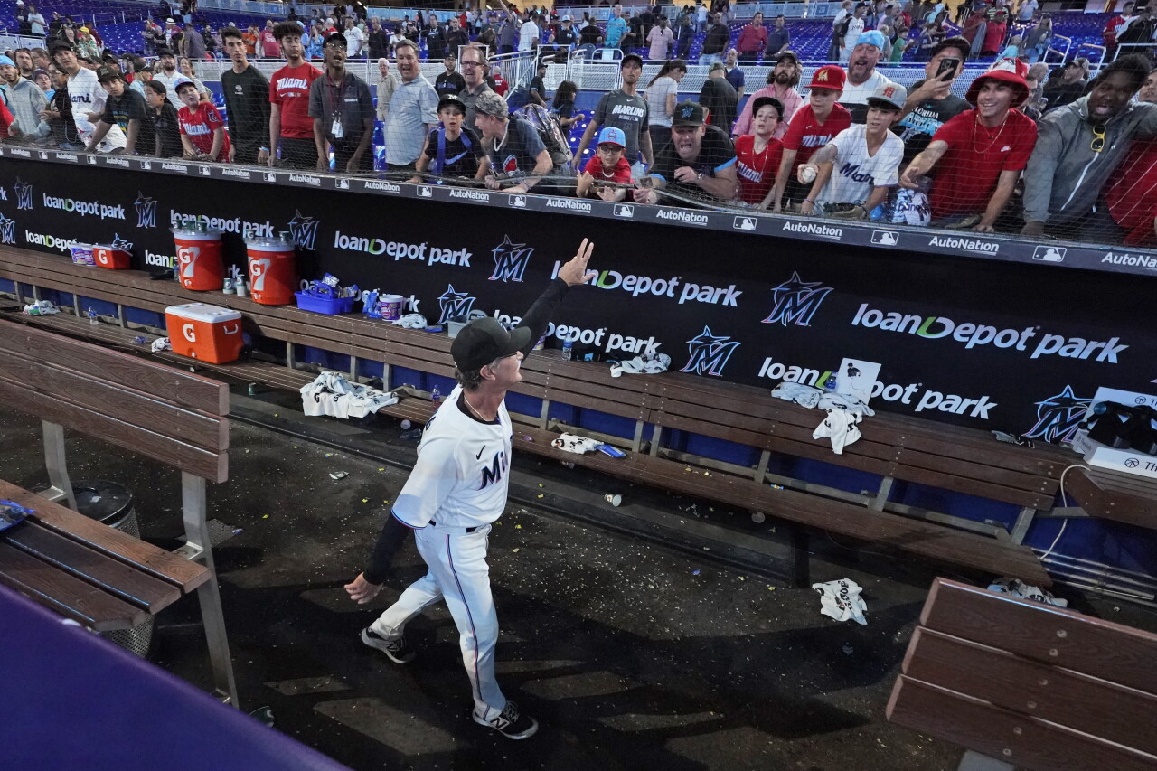 Miami Marlins manager Don Mattingly waves to crowd after final game, Oct. 5, 2022