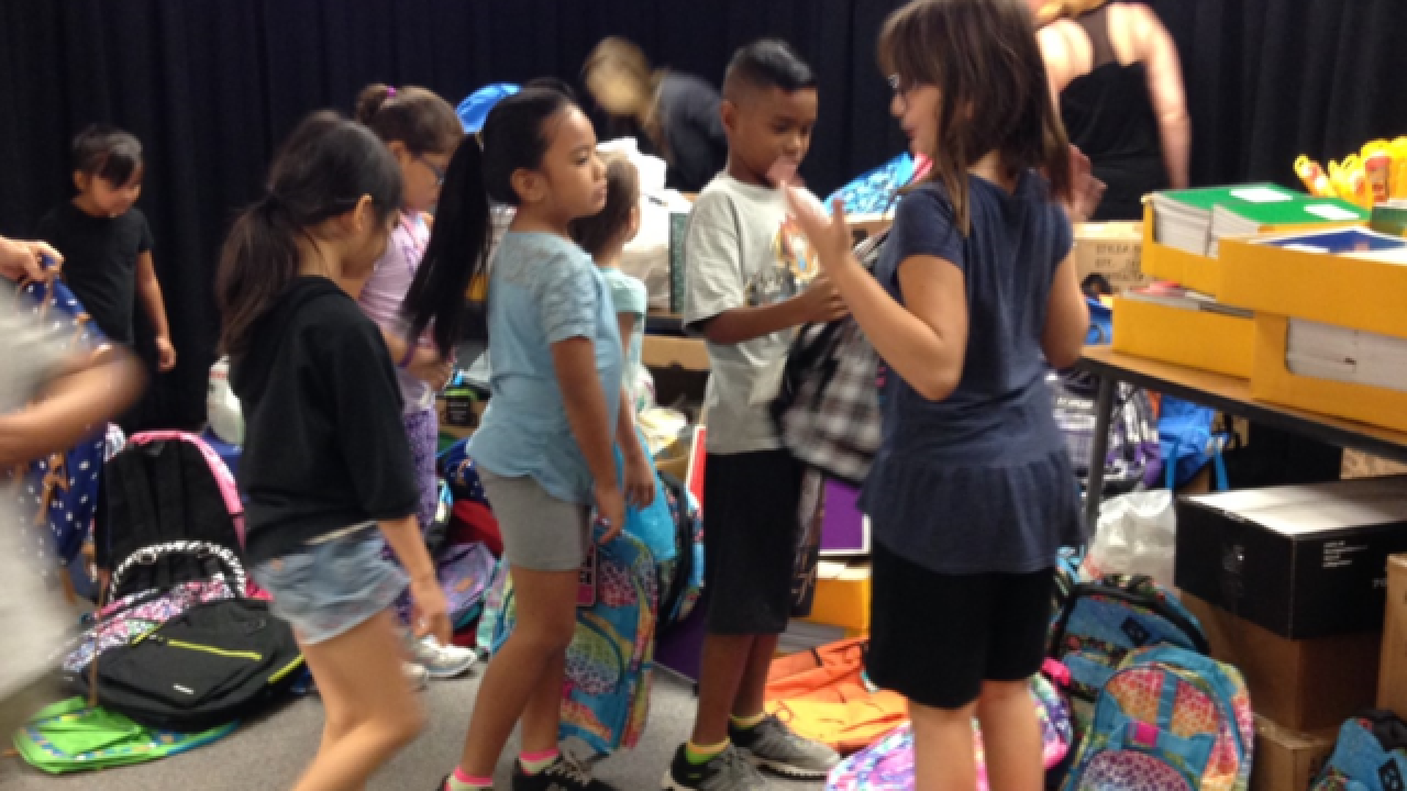 Red Rock employees donate school supplies