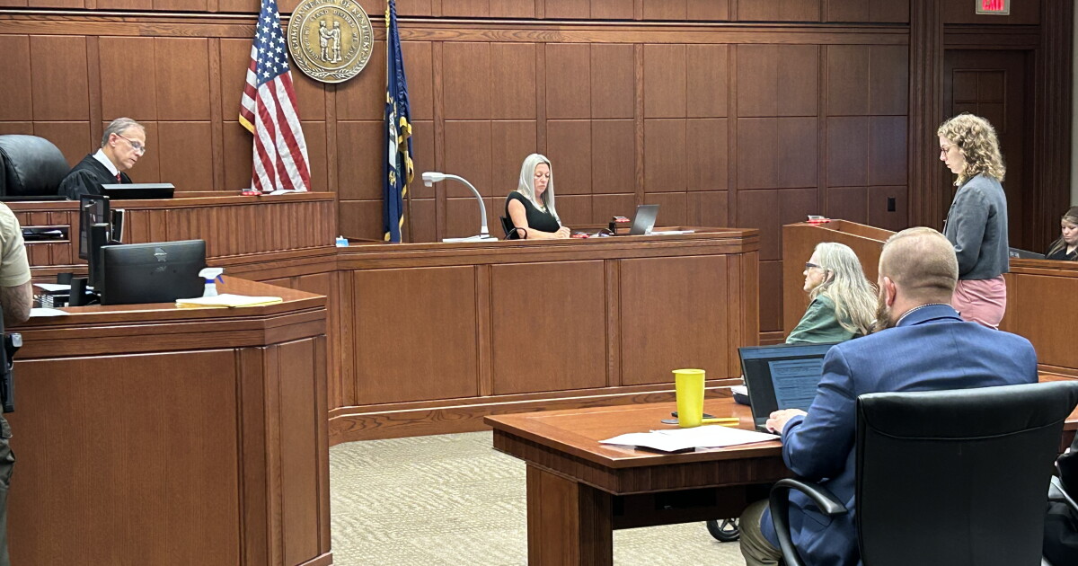 Woman charged in double homicide pleads not guilty