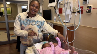 Emahriyah Jackson with twin daughters 