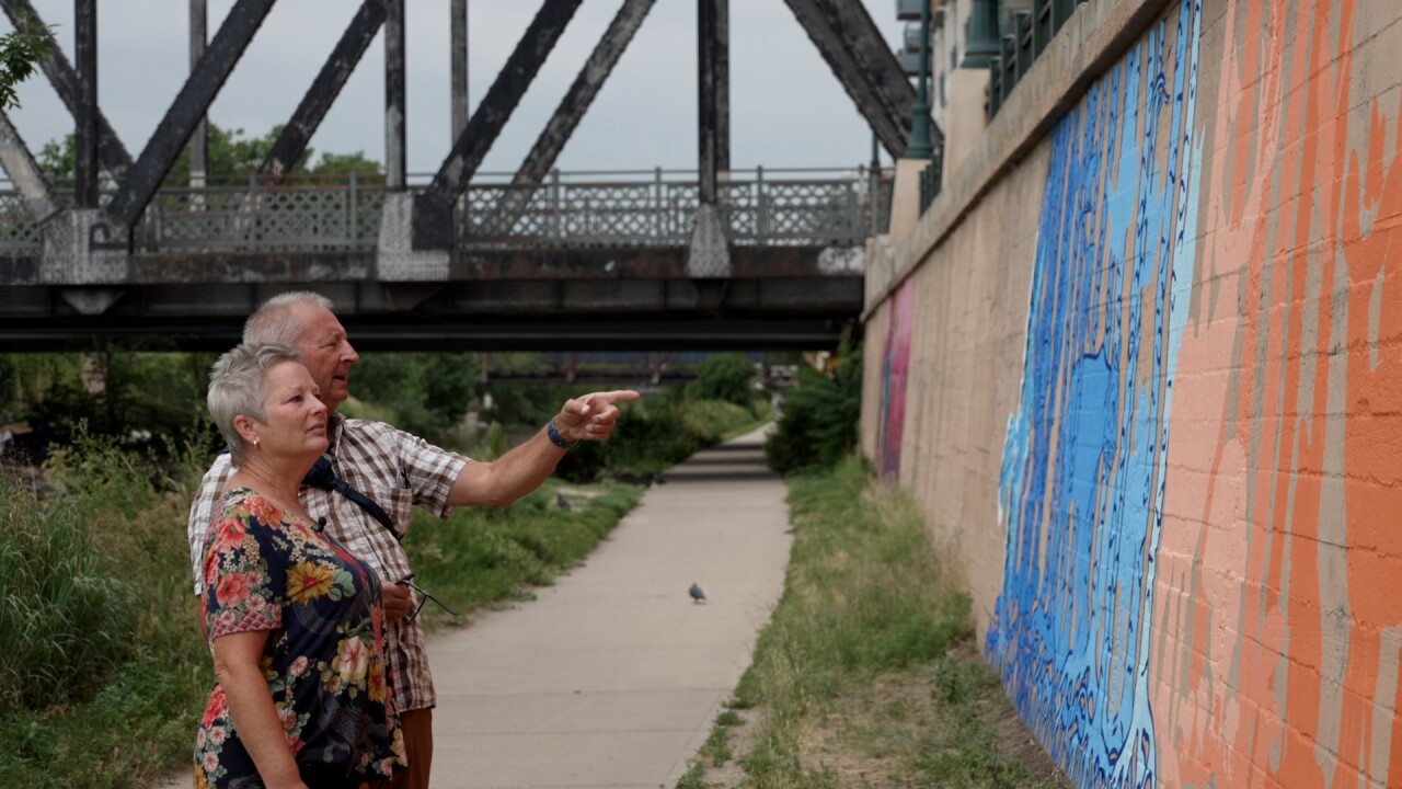 Kenna and Steve looking at the mural.jpg