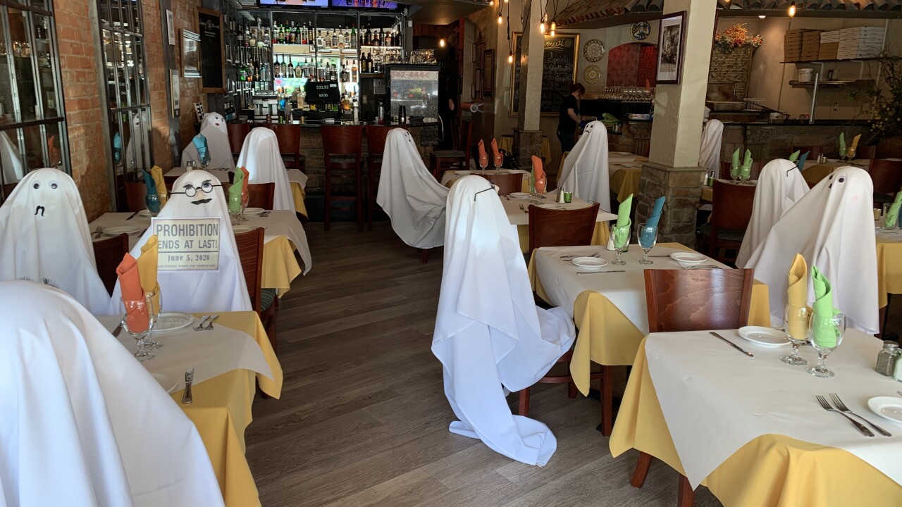 Royal Oak restaurant keeping spirits up with 'ghost tables' in dining room