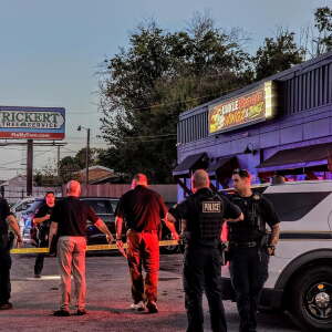 Tulsa police shot an armed suspect Thursday night after he followed a shooting victim inside a restaurant near 51st and Peoria.