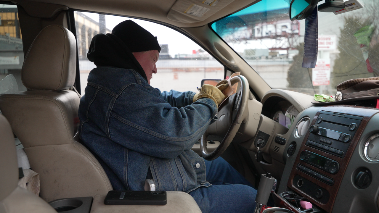 wally working in car.png