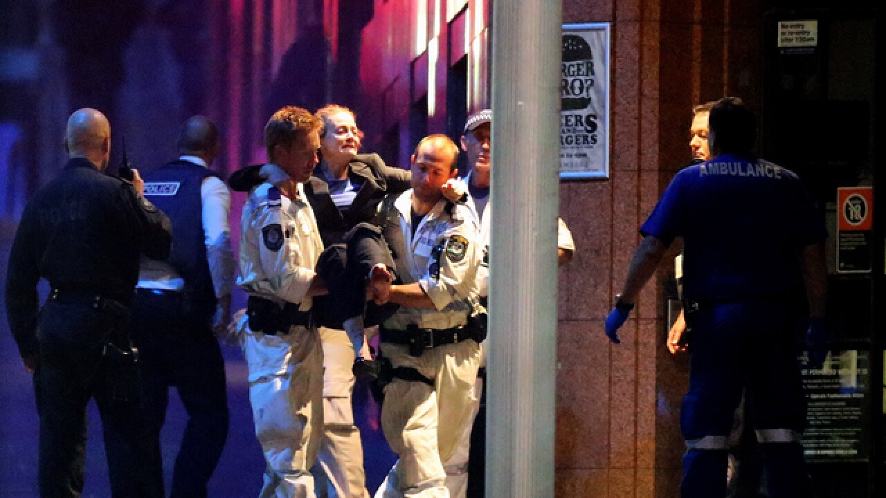 PICS: Standoff at Sydney cafe