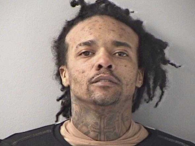 Man holds boy hostage, shoots at police