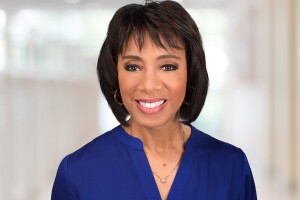 Sherry Hughes in a photo taken in 2016. She is smiling. She has bangs, and her hair is chin length.