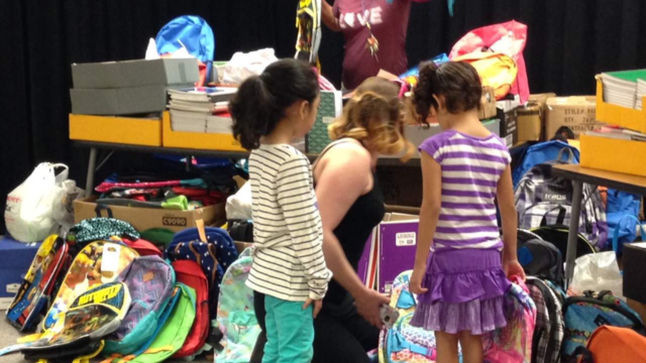 Red Rock employees donate school supplies
