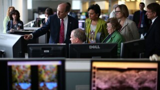 NOAA's National Weather Service Director Louis Uccellini gives a tour of NOAA's Center for Weather and Climate Prediction.