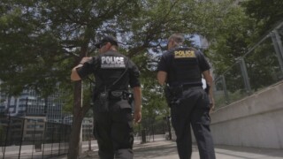 Homeland Security agents walk the streets of Cleveland.