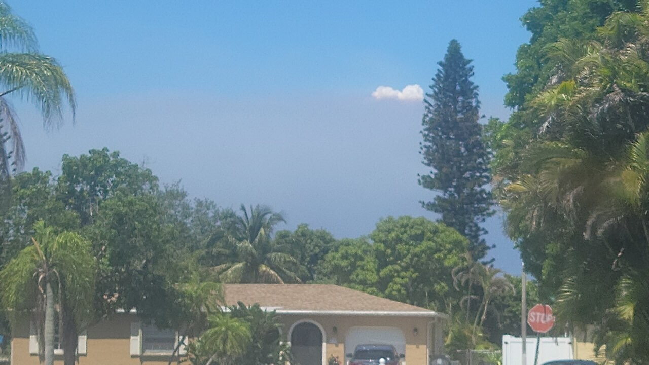 A photo from west Boca Raton of a brush fire burning near the Palm Beach and Broward County line on May 5, 2022.jpg