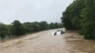Boat Crashes Into Bridge In Flood Waters