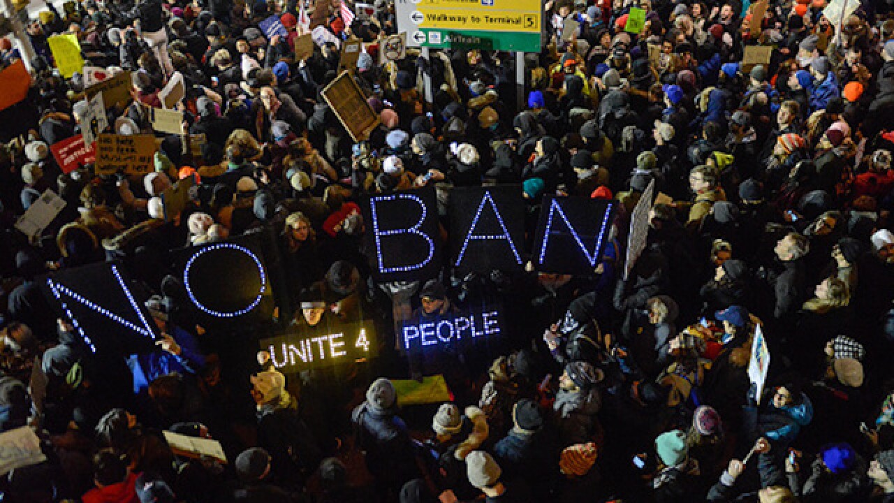 Federal court temporarily halts Donald Trump's immigration ban
