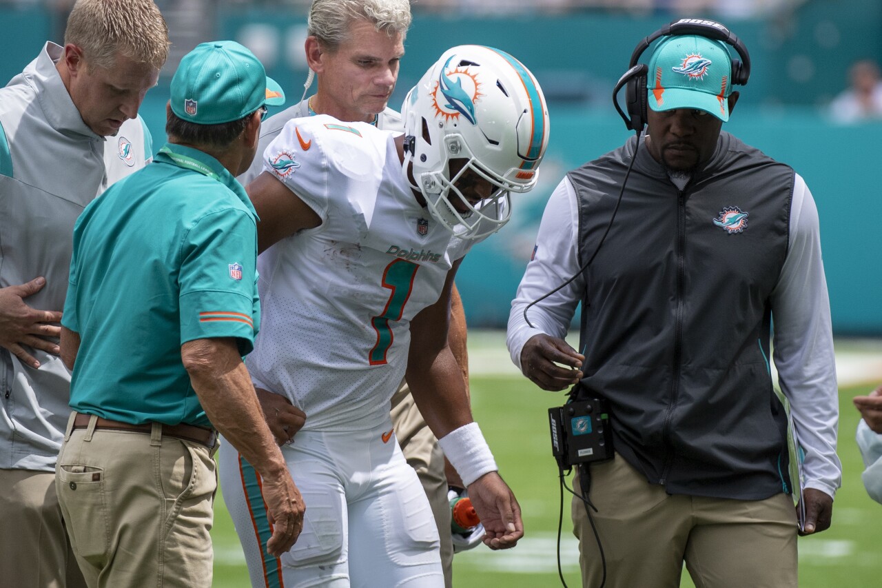 Miami Dolphins QB Tua Tagovailoa helped off field after rib injury vs. Buffalo Bills, Sept. 19, 2021