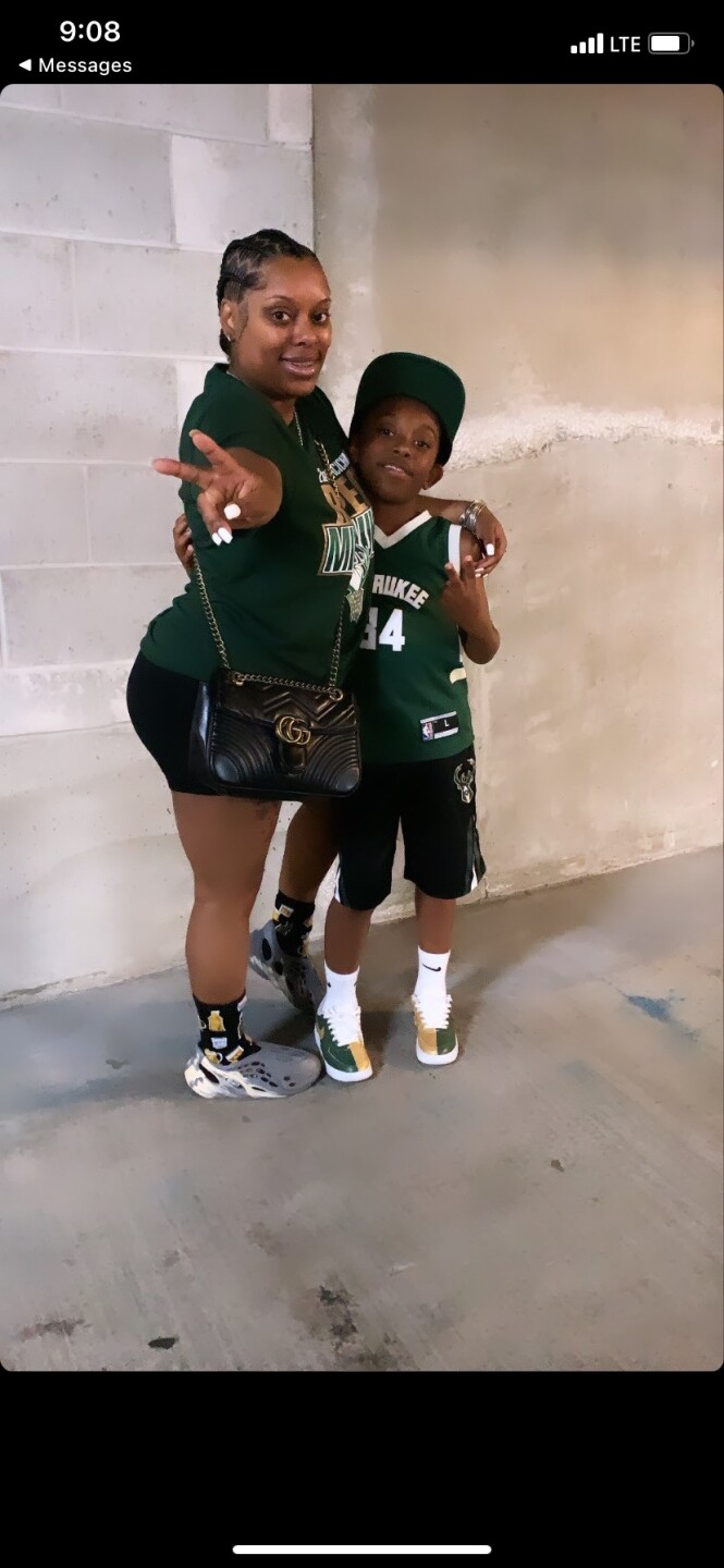 9-year-old Justin Edwards with his mother