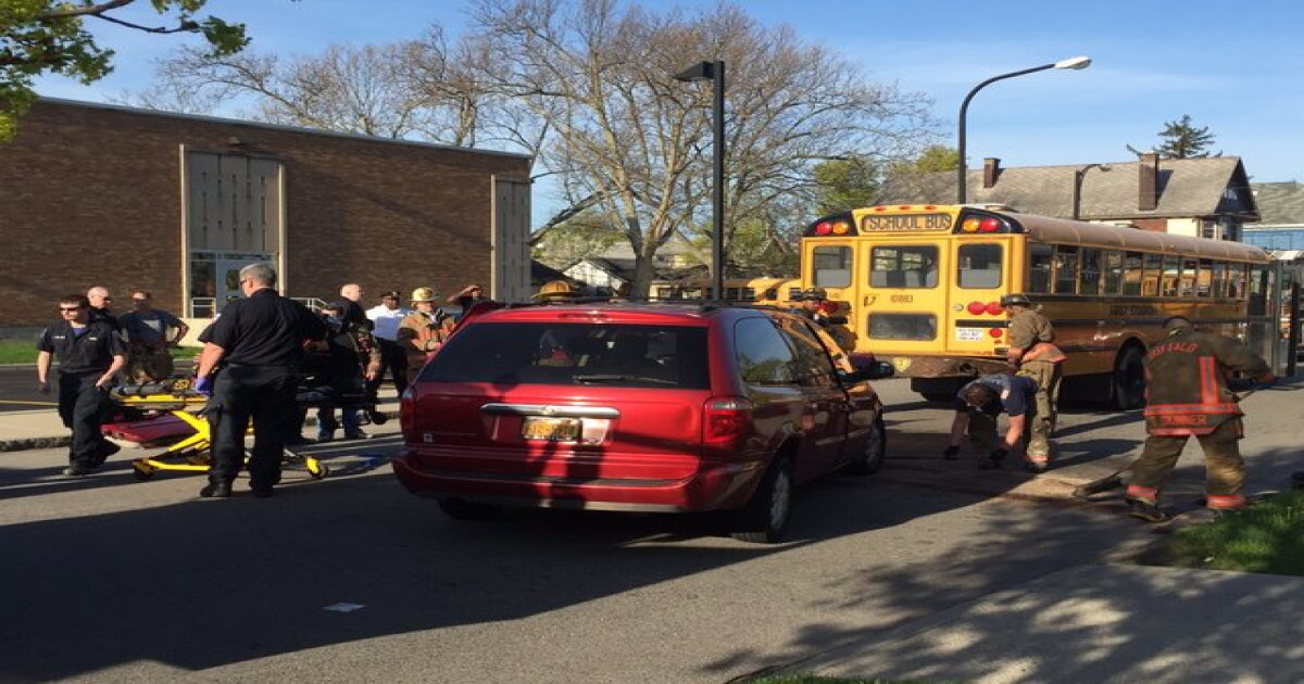 Bus and van collide with children on board