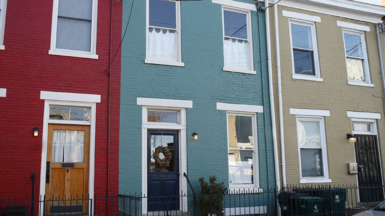 Home Tour This Tiny Row House Like Its History Is Colorful And Full Of Surprises