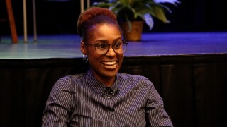 Issa Rae sits for a press conference in Columbia, Missouri.