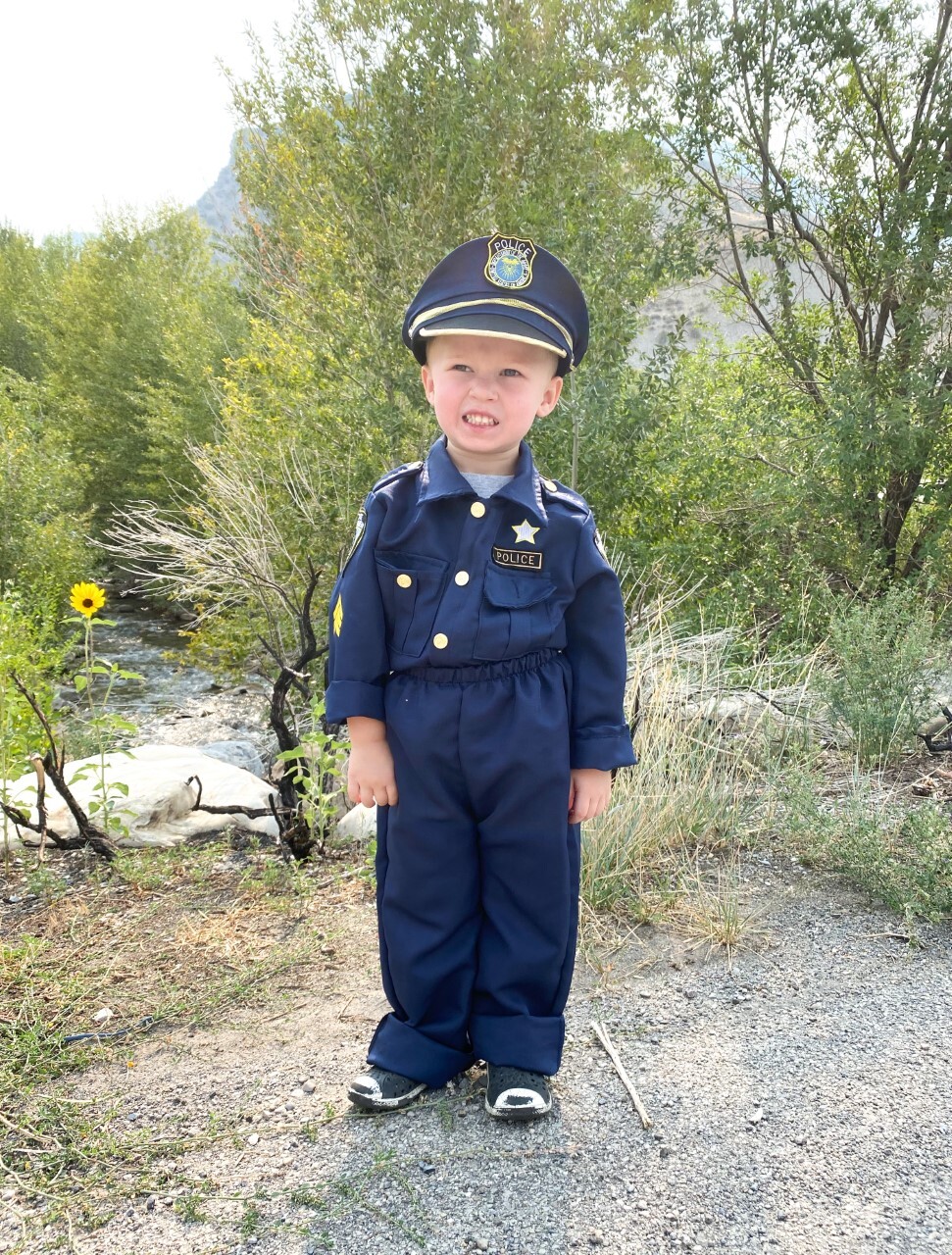 Boy dressed as police office
