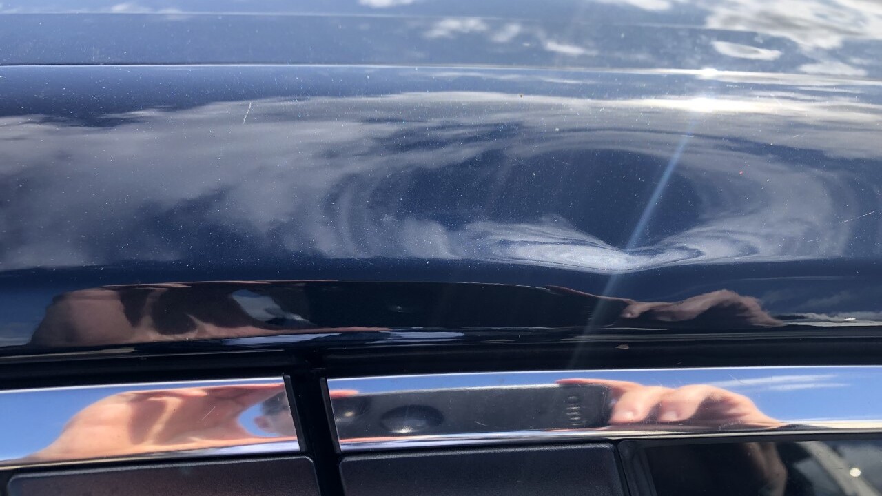 A car in St. Lucie County is damaged from a hail storm on Jan. 10, 2022 (1).jpg