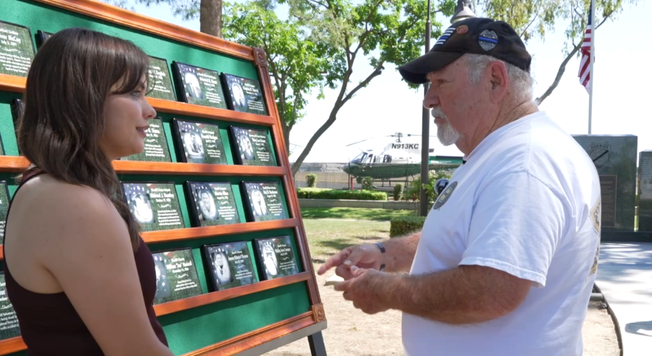 Senior Reporter Veronica Morley interviewing Don Archuleta, who lost his son, Deputy Daniel Lee Archuleta. Don spent time reflecting on his son during the event