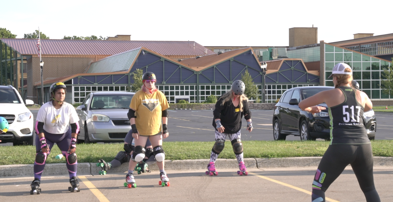 Crane teaching skaters during boot camp