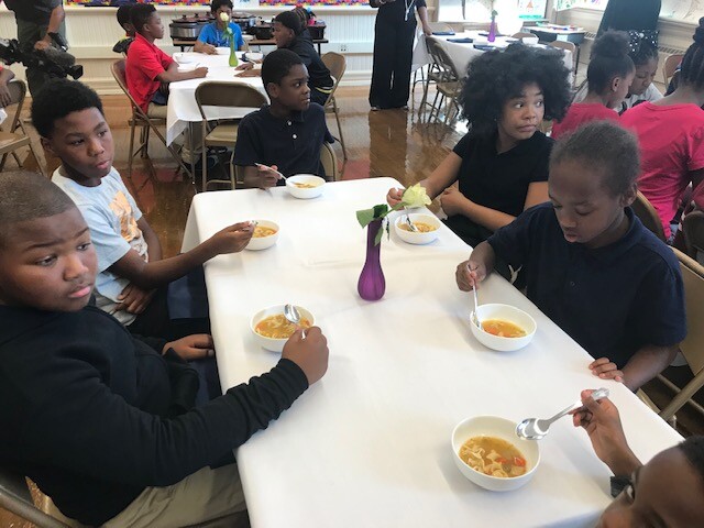 Students listen during manners class