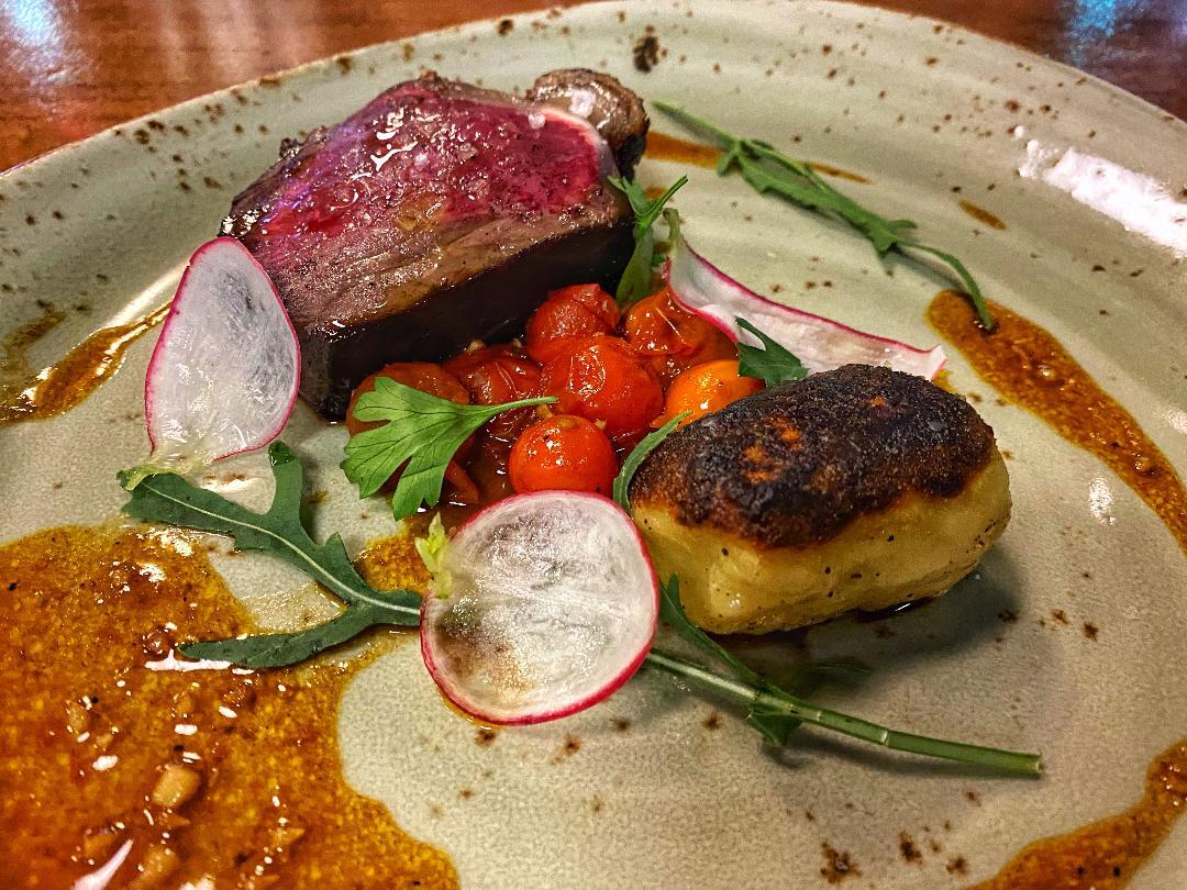 Dante Wood Roasted Bison Loin with Roasted Tomatoes and Gnoccho