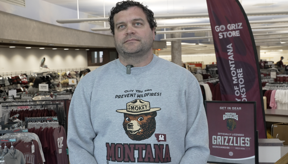 Dave Kuntz, UM's director of strategic communications, wearing a sweatshirt from the clothing line