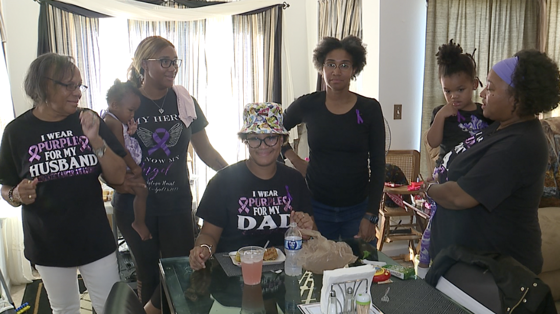 The Hearst family with the shirts they made in honor of Darnell Hearst, raising awareness for pancreatic cancer