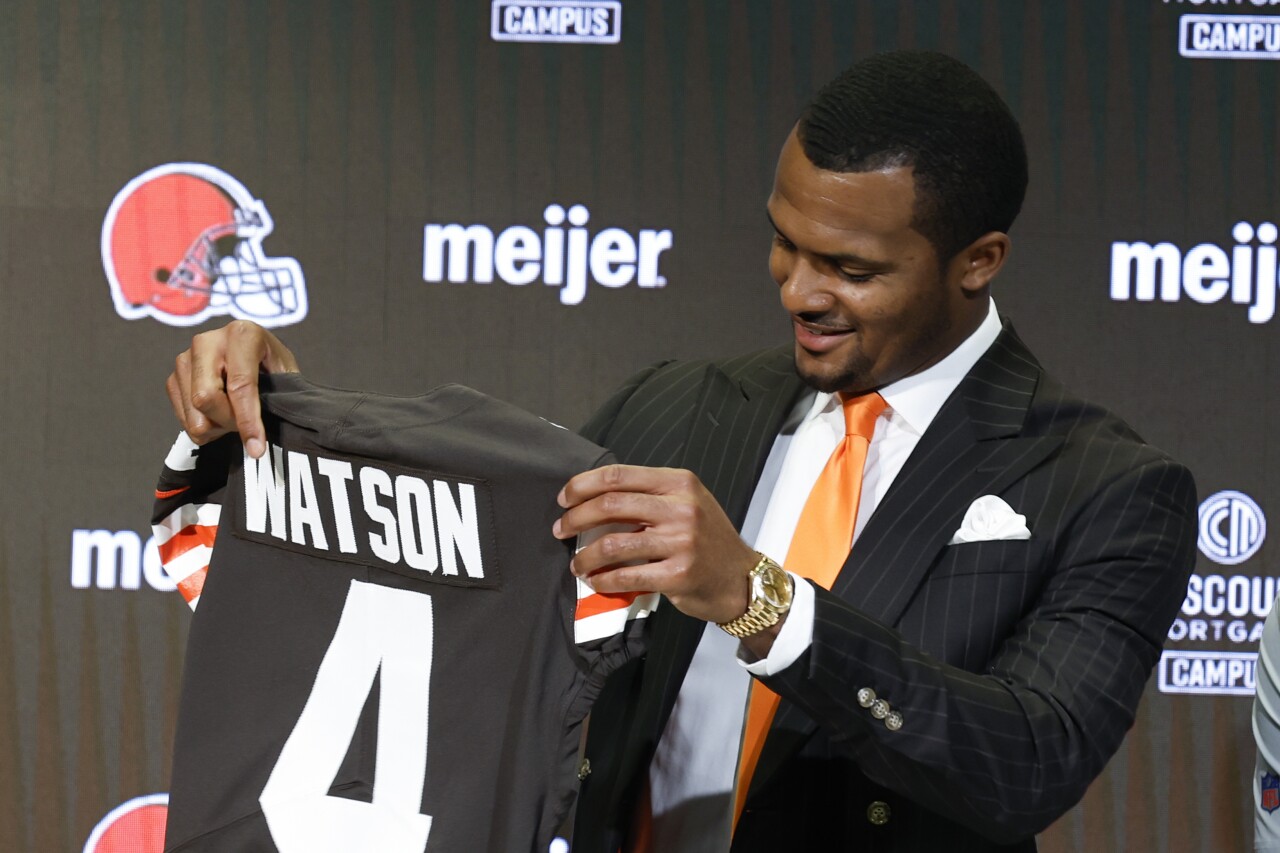 Deshaun Watson holds Cleveland Browns jersey, March 25, 2022