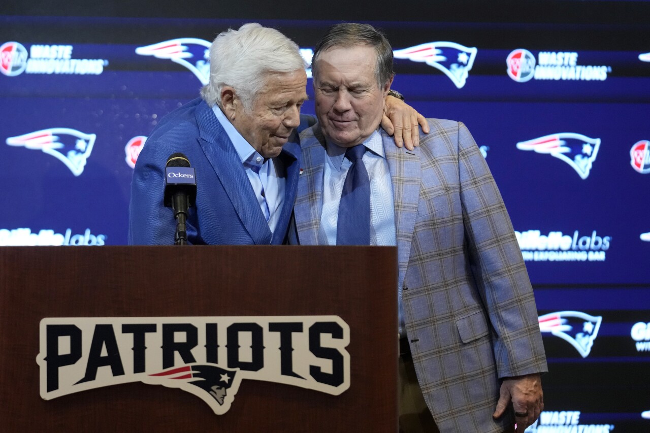 New England Patriots owner Robert Kraft and head coach Bill Belichick embrace at news conference, Jan. 11, 2024