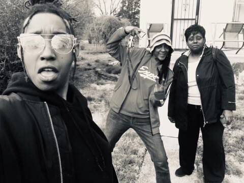 In this undated photo, Siri Imani stands closest to the camera, wearing sunglasses and sticking out her tongue. Her mom, Jennie Wright, poses in the middle of the photo with her right arm bent. Wright's mother, Linda Wright, stands at the right of the photo with a slight smile.