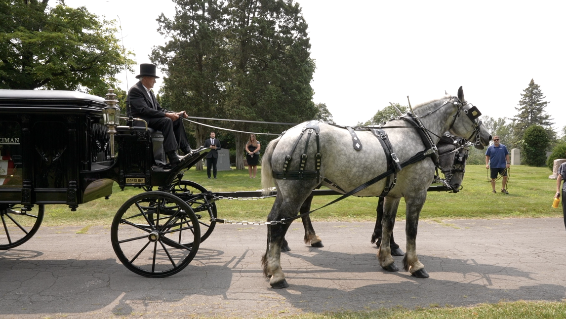 Horse and carriage arrived to the burial site with Lt. Parker's remains