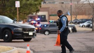 Police officer blocks traffic at The Citadel Mall