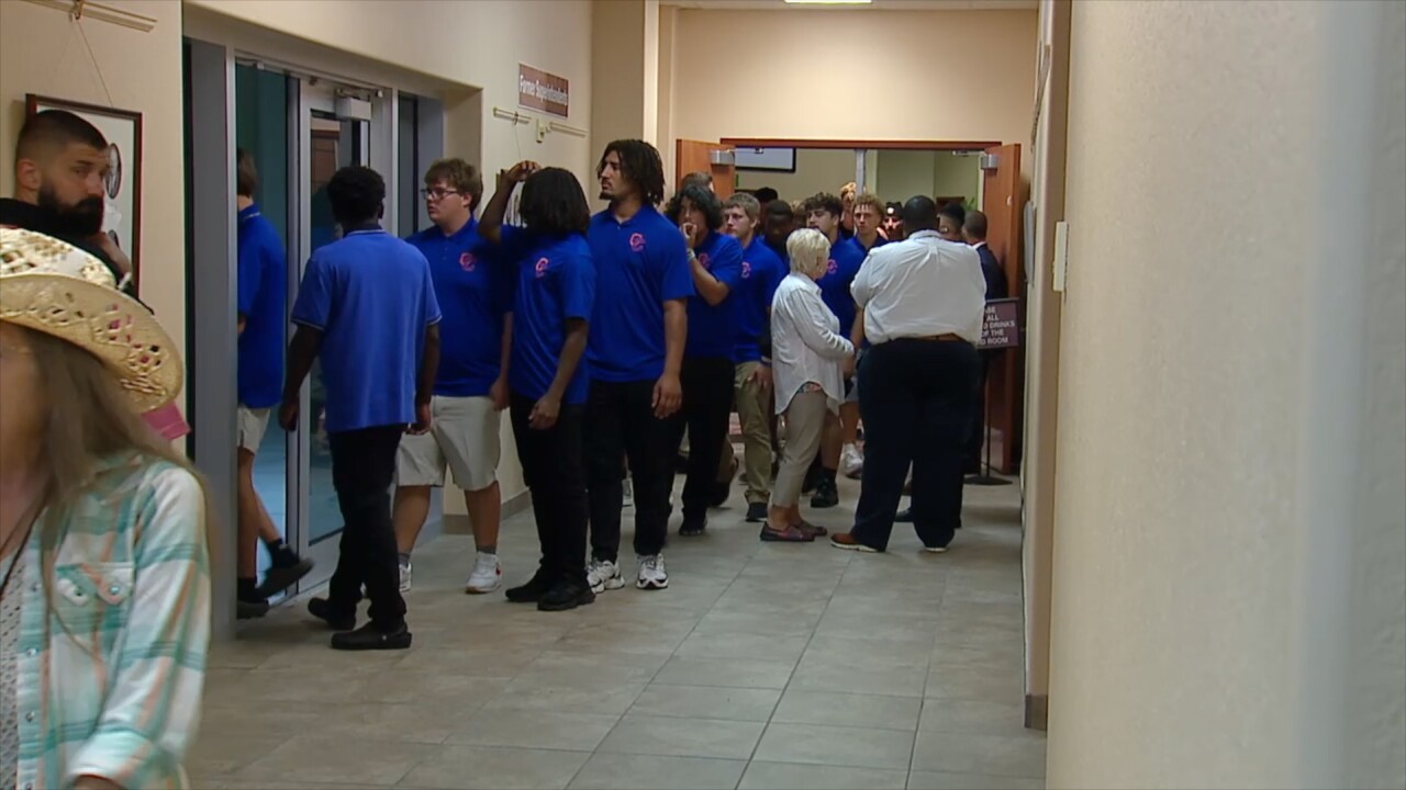 Cape Coral Football players at the Lee County School Board meeting.
