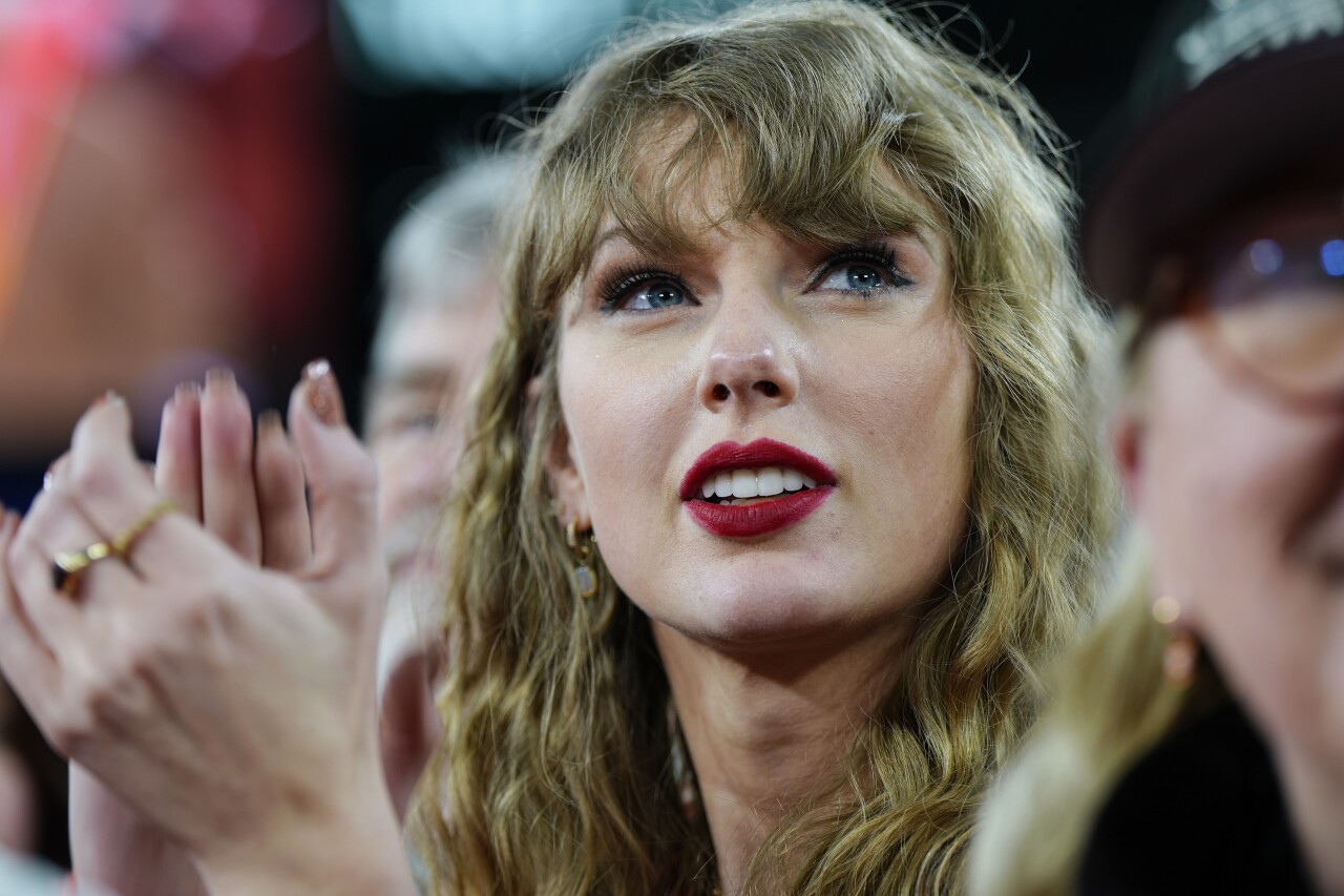Taylor Swift claps after AFC Championship, Jan. 28, 2024