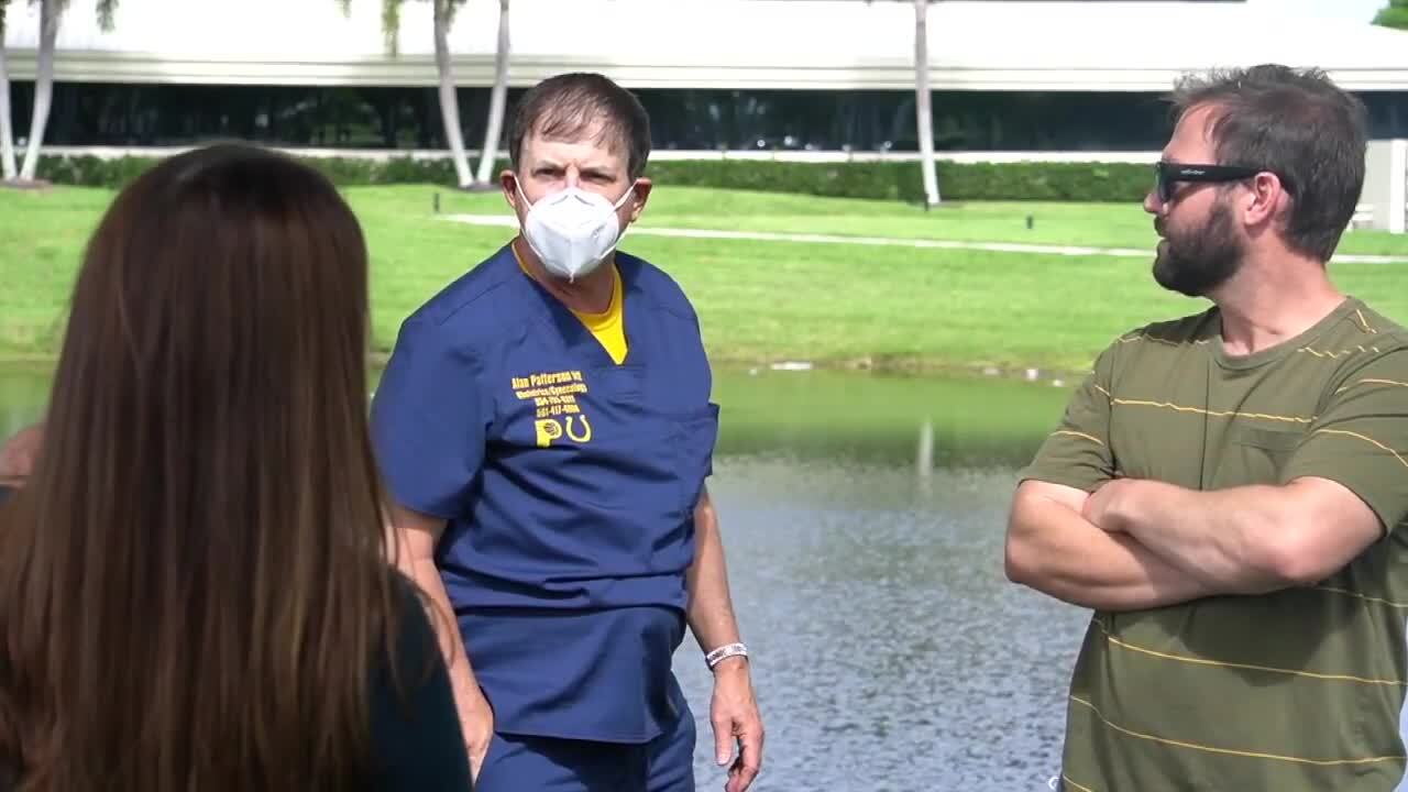 Dr. Alan Patterson speaks with April Lamb and Jason Campion outside West Boca Medical Center