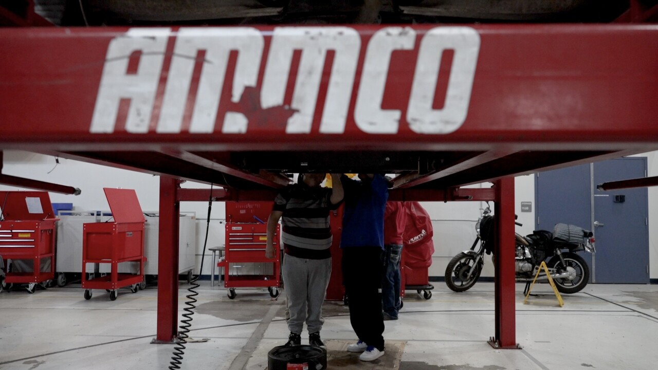 students working on car.jpg