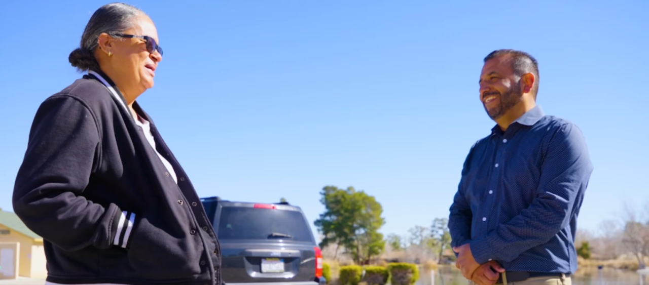 Neighborhood News Reporter Steve Virgen interviewing Salena Coleman, vice president of the Cal City Arts Commission