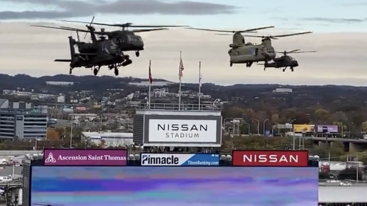 Helicopters fly over Nissan Stadium during Salute to Service