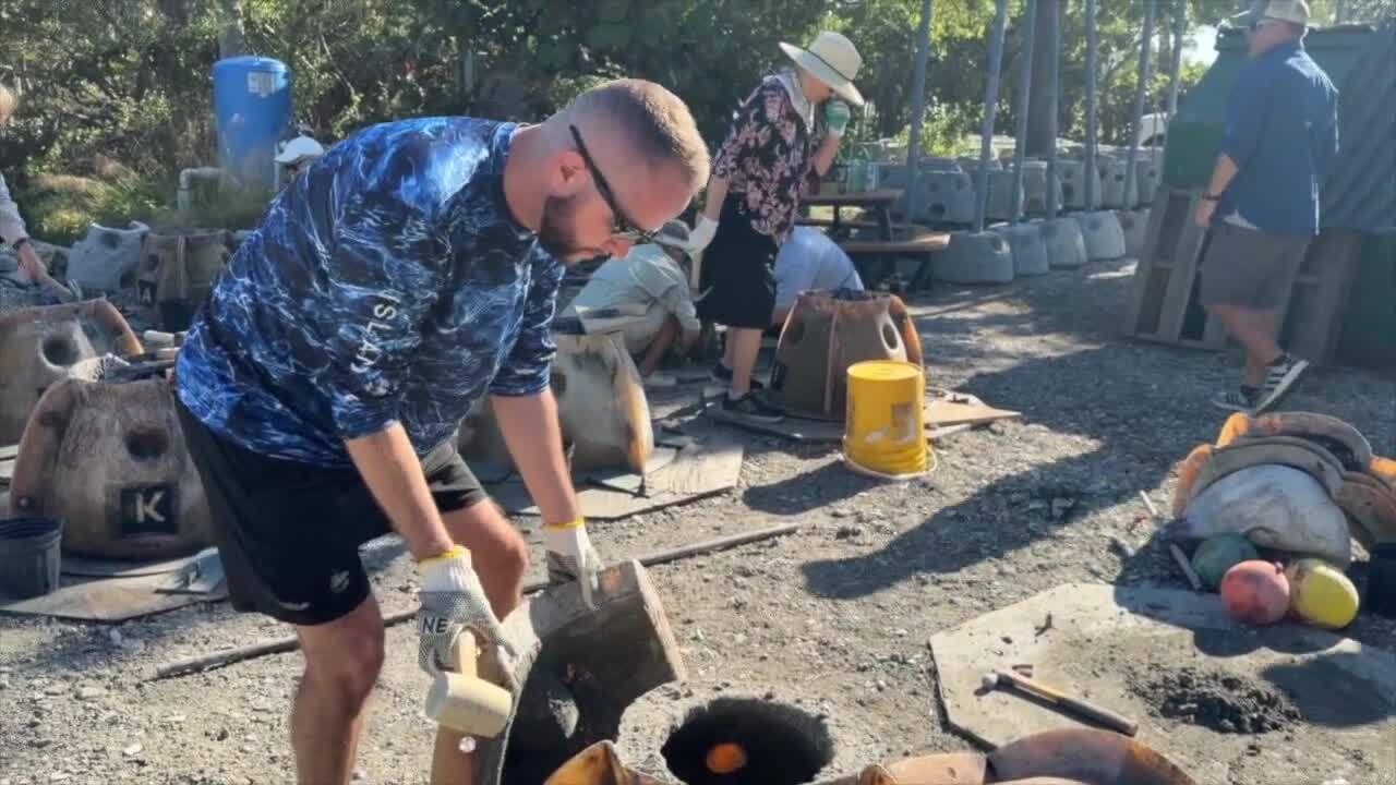 Volunteers install 'oyster reef balls' to help create new homes for oysters