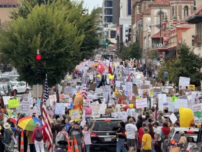'No Kings' protesters marching