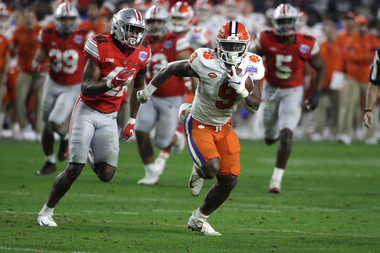Clemson Tigers running back Travis Etienne runs vs. Ohio State Buckeyes in semifinal at Fiesta Bowl