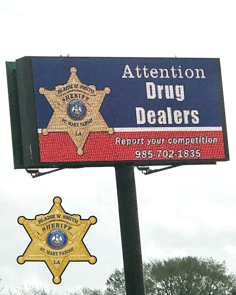 Drug dealers report competition (billboard).jpg