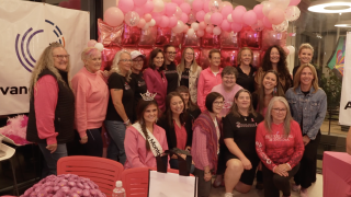 Attendees gather for a group photo at KPAX's first Pink Breakfast celebration.