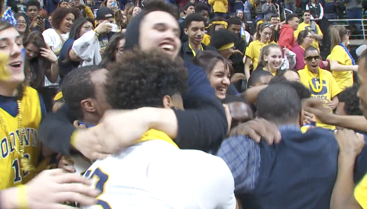 Godwin Heights celebrates the state championship victory over Detroit Henry Ford.