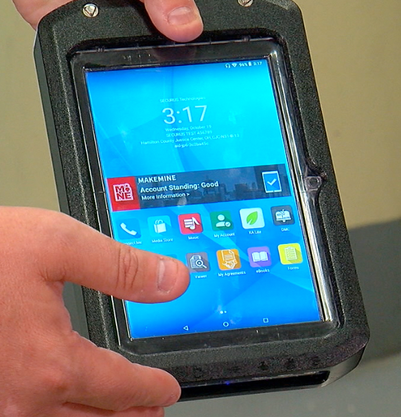 Inmates at the Hamilton County Justice Center can rent tablets for games, movies, books and to communicate.