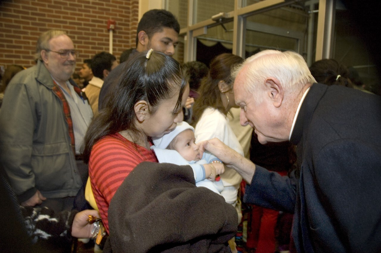 Father Joseph Breen with baby.jpg