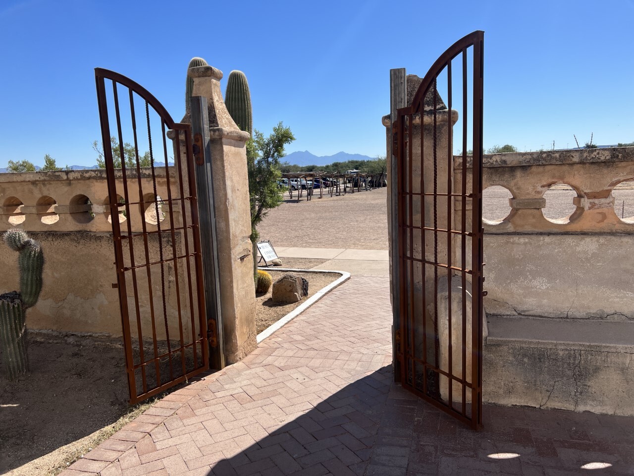 San Xavier gates in front of candle shop